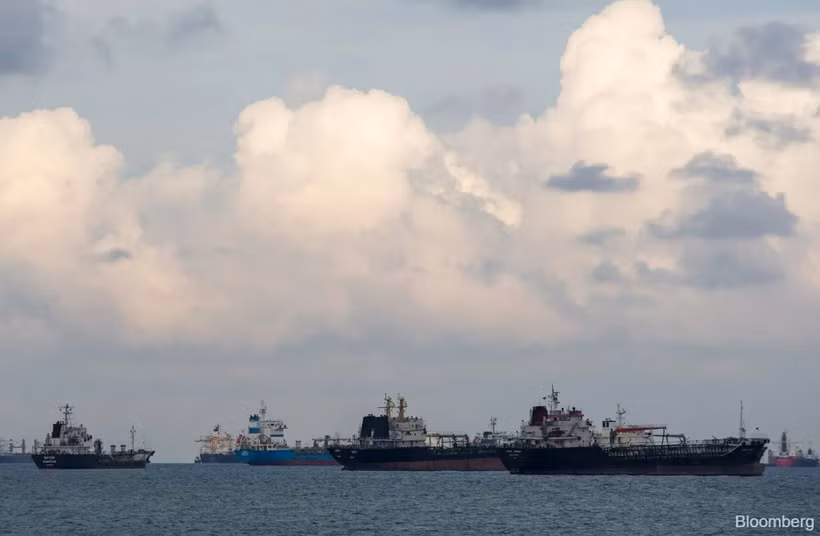 Shipping vessels moored in waters off the southeastern coast of Singapore. (Photo: Blommberg) 
