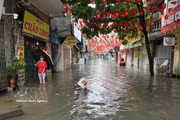 Heavy rain causes widespread flooding in Hanoi