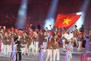 Vietnamese sports delegation parades at Asian Games opening ceremony