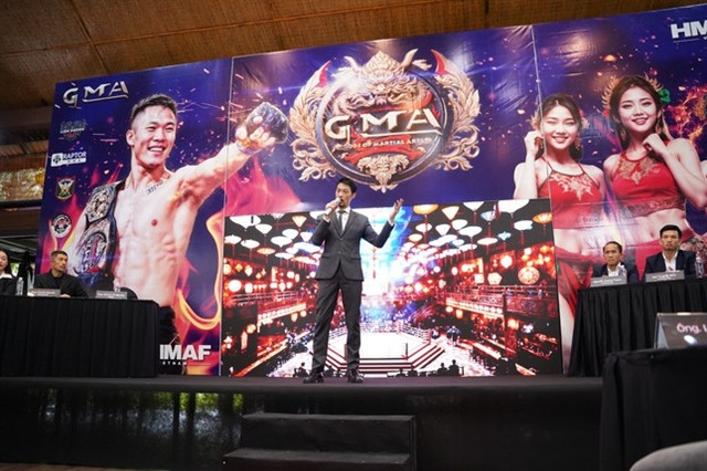 General Director Johnny Trí Nguyễn introduces his Gods of Martial Arts fighting contest which will begin on August 24 in HCM City. (Photo of GMA) 