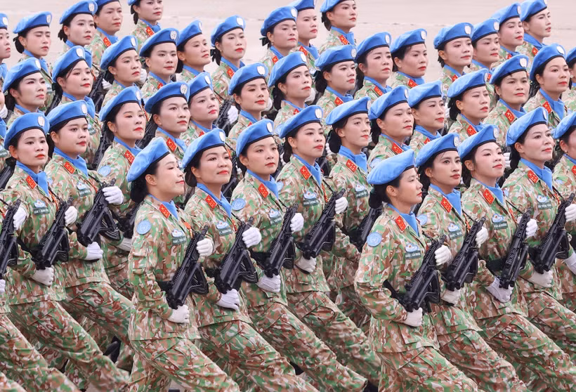 Female peacekeepers march at the ceremony marking the 80th National Day on September 2. (Photo: VNA)