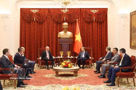 Top leader receives FIFA President in Hanoi