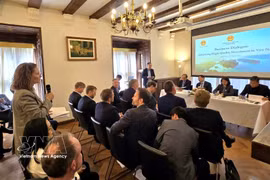 A representative of Denmark businesses speaks at the dialogue. (Photo published by VNA)