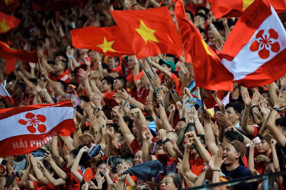 Fans cheer for the Vietnam women’s national football team. (Photo: Pham Hau - VNA)