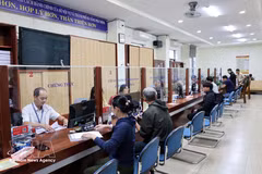 The success of the two-tier local administration model will be measured by the pace of local development and the satisfaction of citizens. (Photo: VNA)