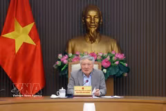 Permanent Deputy Prime Minister Nguyen Hoa Binh speaks at the meeting to review the development strategy and operational framework for the international financial centre. (Photo: VNA)