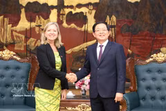Deputy Prime Minister Ho Quoc Dung (R) receives Mariam Sherman, WB Division Director for Vietnam, Cambodia and Laos, in Hanoi on June 19. (Photo: VNA)