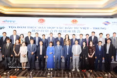 Delegates at the Vietnam-China investment cooperation promotion seminar jointly organised in Beijing on August 24 pose for a photo. (Photo: VNA)