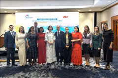 Delegates attend the Vietnam Tourism Roadshow in Washington D.C. (Photo: VNA)