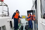 The Vietnam and China Coast Guards conduct a joint patrol in the Gulf of Tonkin. (Photo: VNA)
