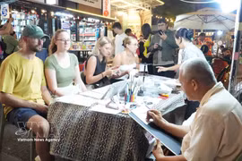 Foreign visitors at the event (Photo: VNA)