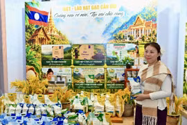 A booth showcasing rice products from Laos. (Photo: VNA) 