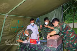 Authorities digitise data collected during the sampling and forensic identification process for fallen soldiers' remains. (Photo: VNA)
