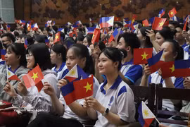 Nearly 1,000 students and lecturers from universities and colleges across Can Tho city attend the event at Can Tho University on July 15, 2026. (Photo: VNA) 