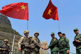 Vietnam and China carry out a joint border patrol. (Photo: VNA)