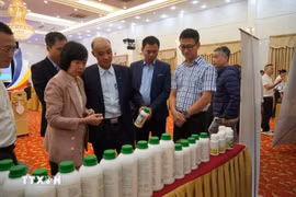 Delegates visit a product exhibition space at the conference reviewing the 2022–2025 implementation of the national startup ecosystem support scheme. (Photo: VNA) 