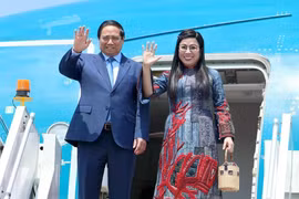PM Pham Minh Chinh and his spouse (Photo: VNA)