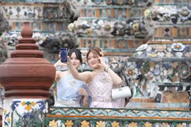Tourists in Bangkok, Thailand. (Photo: Xinhua/VNA)
