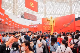 Visitors at the exhibition of national achievements “80 Years of Independence – Freedom – Happiness". (Photo: VNA)