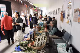 Communities at the festival showcase distinctive cultural products from their countries. (Photo: VNA)