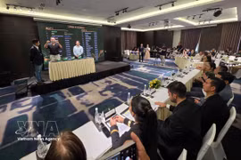 Delegates at the tournament’s group-stage draw ceremony. (Photo: VNA) 