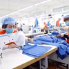 Workers make clothes for export to Japan at Hung Viet Garment Company in Hung Yen province (Photo: VNA)