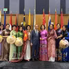 Vietnamese Ambassador to the US Nguyen Quoc Dung and his spouse pose for a photo with delegates at the event (Photo: VNA)