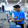 Vietnam sets a goal to raise GDP per capita to around 8,500 USD by 2030. (Photo: VNA)