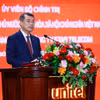 PM Le Minh Hung speaks at the working session with Unitel in Vientiane on October 9, 2026. (Photo: VNA)