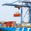 Ports in Ho Chi Minh City are always bustling with ships loading and unloading cargo (Photo: VNA)
