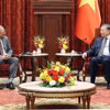 General Secretary of the Communist Party of Vietnam Central Committee and President To Lam (R) meets with President and CEO of Qualcomm Incorporated Cristiano Amon in Hanoi on August 27. (Photo: VNA)