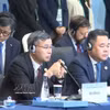 Vietnamese Minister of Finance Ngo Van Tuan (left) attends the 33rd APEC Finance Ministers' Meeting in Hong Kong (China). (Photo: VNA)