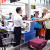 International tourists complete procedures at Lien Khuong International Airport. (Photo: VNA)