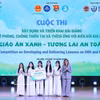 UNICEF Representative in Vietnam Silvia Danailov (first, right) honours first winners of the teaching materials competition. (Photo: VNA)