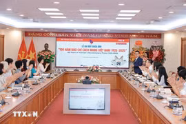 A ceremony is held to launch the photo book “100 Years of Vietnam’s Revolutionary Press (1925–2025).” (Photo: VNA)