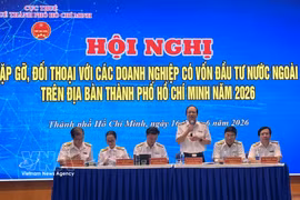 Representatives of Ho Chi Minh City's tax agency address concerns and clarify tax-related issues raised by the FDI business community. (Photo: VNA)