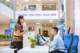Investing in human resources at the commune and grassroots levels is critically important. (Photo: VietnamPlus)