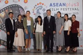 Vietnamese Ambassador to the Czech Republic Duong Hoai Nam poses for a commemorative photo with embassy staff at the opening ceremony. (Photo: VNA)