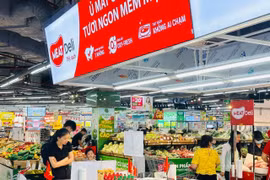 Hanoi prioritises cashless payment solutions during promotion month. (Photo: hanoimoi.vn) 