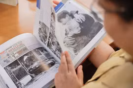 The photo book titled “100 Years of Vietnam’s Revolutionary Press” (Photo: VNA)