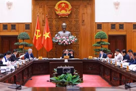 Prime Minister Pham Minh Chinh chairs a session of the Government Party Committee's Standing Board on the administrative reorganisation and the shift to a two-tier local government model. (Photo: VNA)