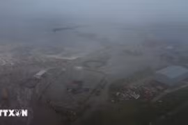 Tsunami wave causes flooding in Russian coastal town of Severo-Kurilsk after a powerful earthquake struck off the country’s far eastern Kamchatka Peninsula on July 30. (Photo: AA/VNA)