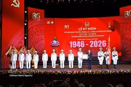 National Assembly Chairman Tran Thanh Man presents the Ho Chi Minh Order to the external security force at the ceremony in Hanoi on July 1, in recognition of its outstanding contributions to the revolutionary cause of the Party and the nation. (Photo: VNA)