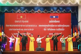 A performance by Vietnamese and Lao young military officers at the exchange. (Photo: VNA)