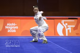 Wushu star Duong Thuy Vi in her qiangshu performance at ASIAD 2026 on September 23 (Photo: VNA)