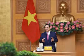 PM Pham Minh Chinh speaks at the reception (Photo: VNA)