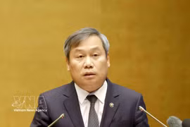Vu Dai Thang, Chairman of the Hanoi People’s Committee, speaks at the national conference on studying, disseminating and implementing the Politburo’s Resolution No. 10-NQ/TW on developing the foreign-invested economic sector, held in Hanoi on June 30, 2026. (Photo: VNA)