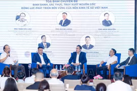 Delegates share their insights at the seminar titled "Verification and Traceability – A Driver for Vietnam’s Sustainable Digital Economy". (Photo: VNA)