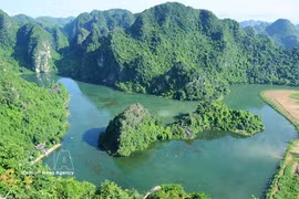 A view of the Trang An Scenic Landscape Complex - the first mixed cultural and natural heritage site in Vietnam. (Photo: VNA)