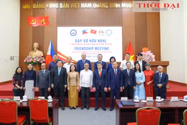 Delegates attend the friendship meeting to celebrate the 50th anniversary of diplomatic relations between Vietnam and the Philippines. (Photo: thoidai.com.vn)